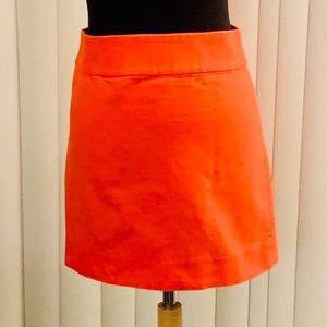 J. Crew bright orange "double serge" mini skirt.